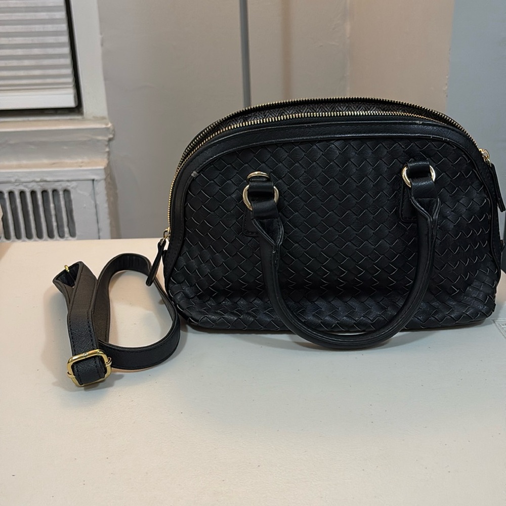 Black top handle bag with strap